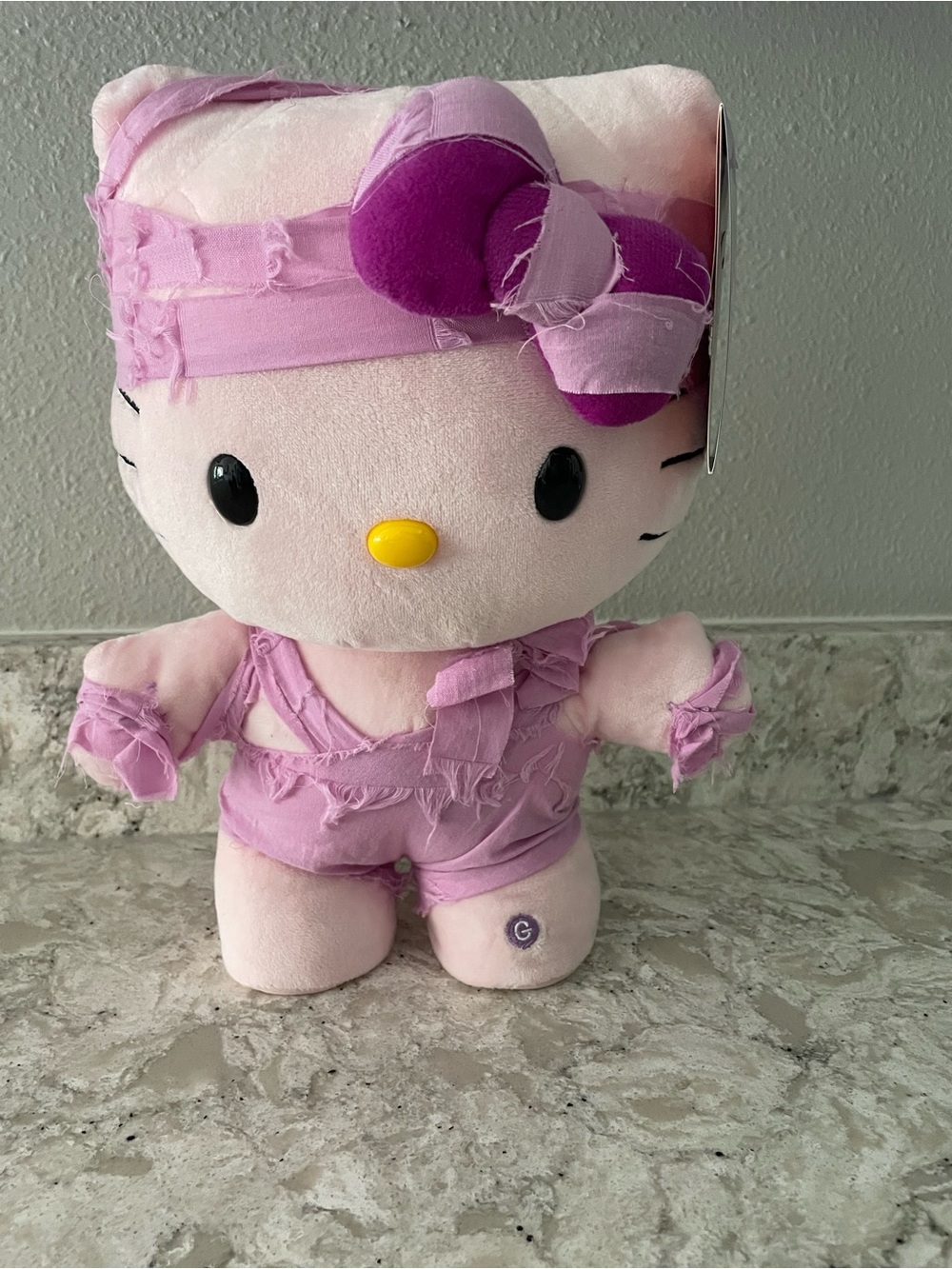 Sanrio Hello Kitty Plush in Light Pink and Purple Accent